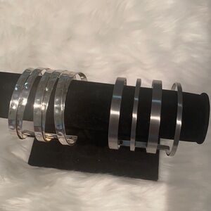 Pair of NEW silver tone cuff bracelets